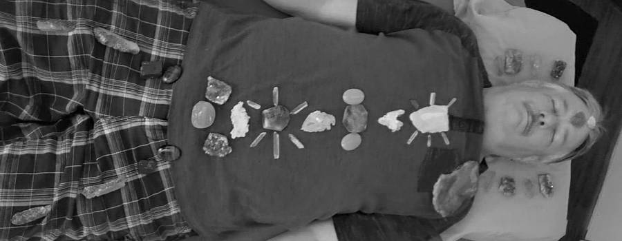 crystal layout on a man at Crystal Healing Concepts in Green Valley, Arizona